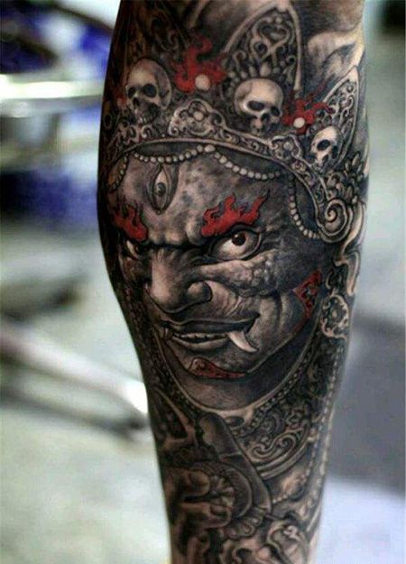 手臂鬼王纹身图片