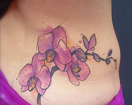 后腰部蝴蝶兰纹身图片