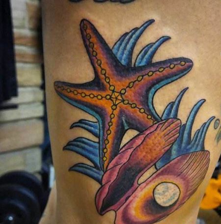 侧腰海星珍珠纹身图片