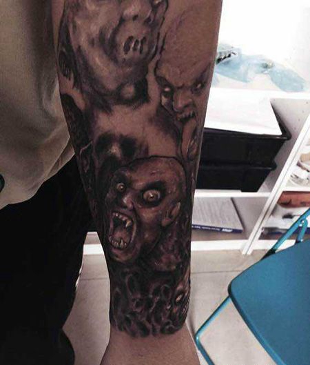 手臂个性鬼头纹身图案