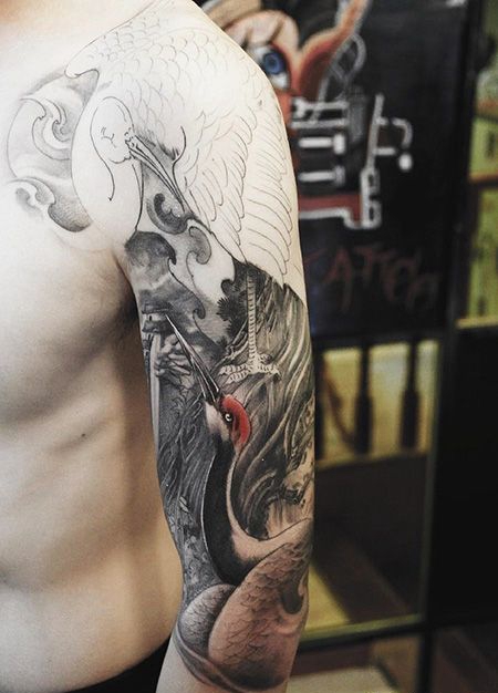 大臂仙鹤纹身图片
