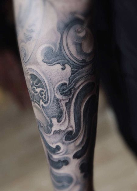 手臂精致的海浪纹身图片