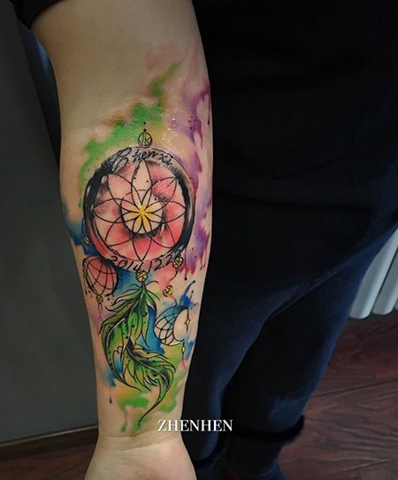 手臂泼墨捕梦网纹身图案