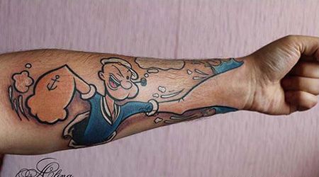 手臂有创意的大力水手纹身图案