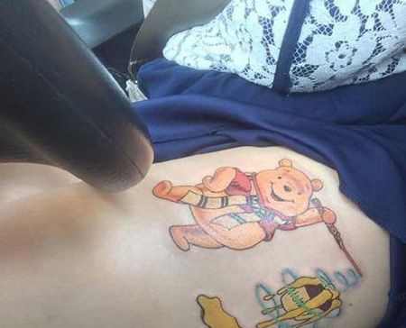 女生大腿小熊维尼纹身图案