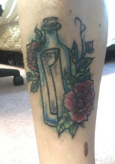 小腿漂流瓶纹身图片