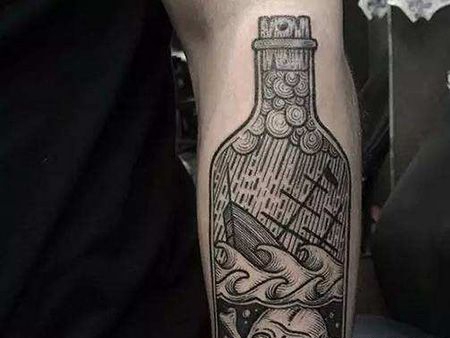 小腿有创意的漂流瓶纹身图案