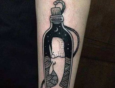 手臂有创意的漂流瓶纹身图案