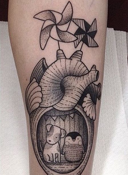 小腿风车海螺纹身图案