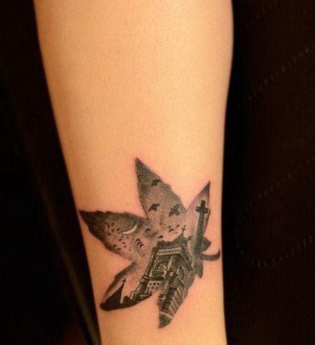 手臂枫叶创意教堂纹身图案