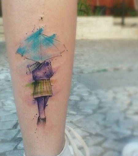小腿拿着雨伞的女孩纹身图案