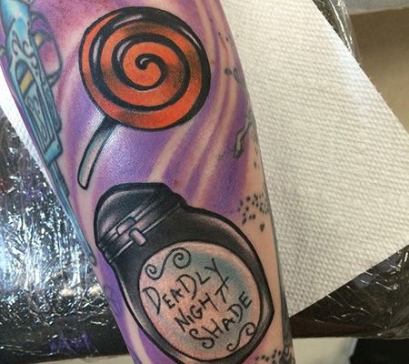 手臂个性棒棒糖纹身图案