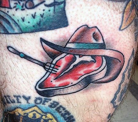 大腿牛排帽子纹身图案