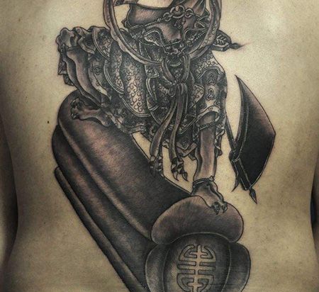 背部鬼踩棺材纹身图案