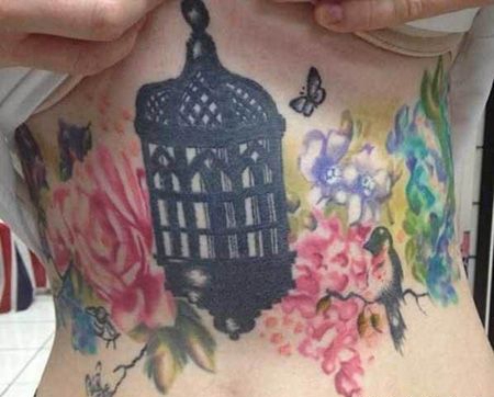 女生腹部黑色鸟笼纹身图案