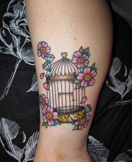 小腿樱花鸟笼纹身图案