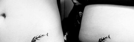 情侣腹部鱼骨纹身图案