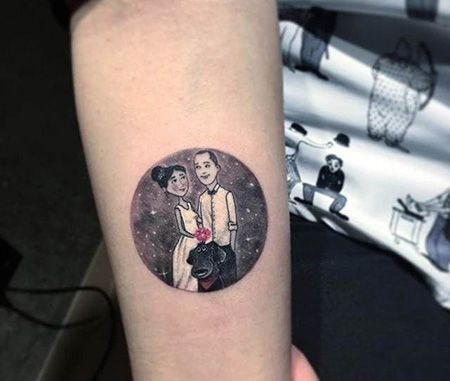 手臂夫妻圆形合影纹身图案