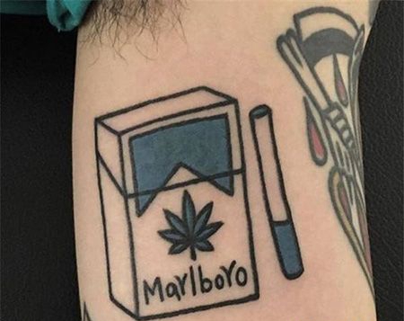 大臂万宝路香烟纹身图案