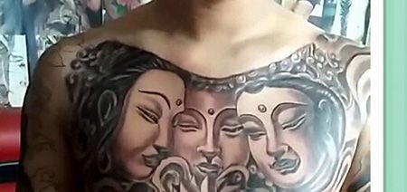 胸前个性三面佛纹身图片