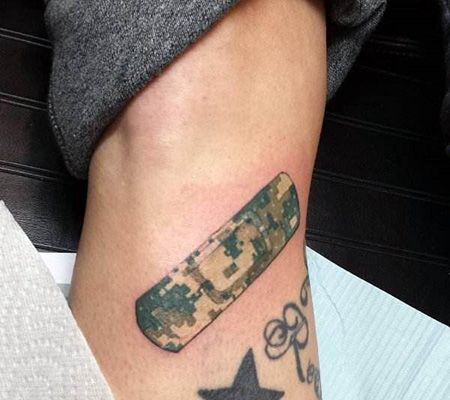 小腿创可贴纹身图案