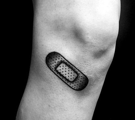 腿部个性创可贴纹身图片