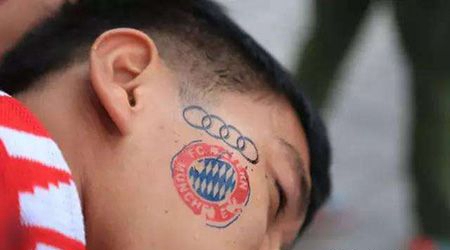 脸部奥迪车标纹身图案