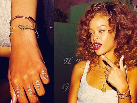 演员rihanna个性手指白色纹身