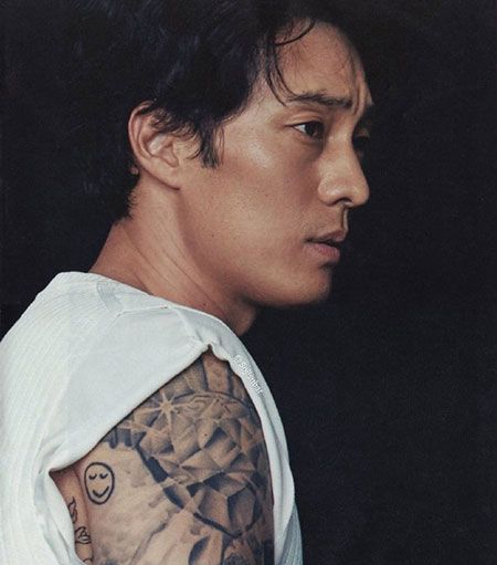 苏志燮手臂小清新笑脸纹身