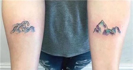手臂水彩海浪和山脉纹身图案