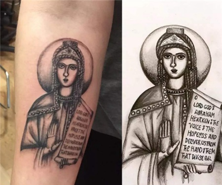 手臂上圣母手持圣经纹身图案
