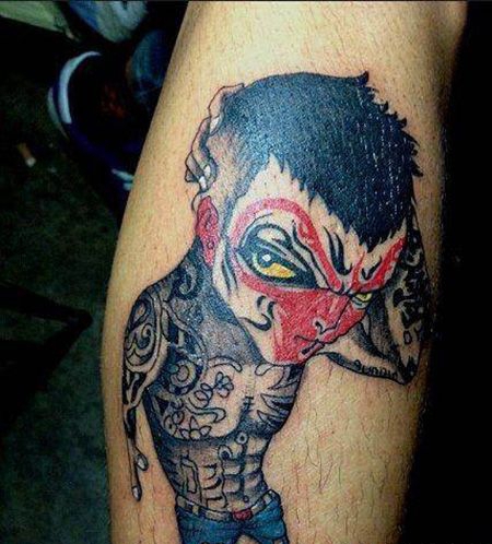 小腿摸头的社会猴纹身图案