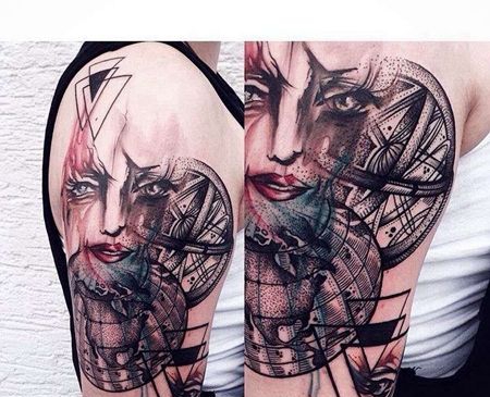 大腿几何点刺人脸写实纹身图案