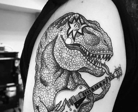 点线大臂恐龙吉他纹身图案