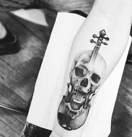 写实小臂骷髅小提琴纹身图案