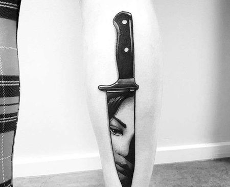 大腿匕首人像纹身图案