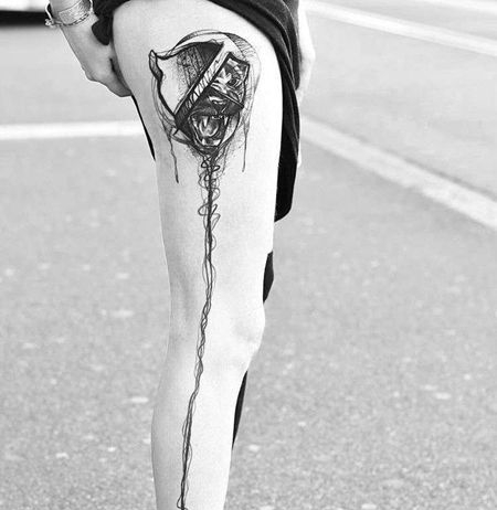 点线泼墨大腿豹子纹身图案