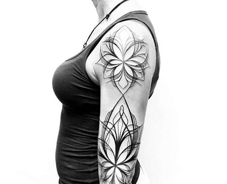 几何线条大臂花卉纹身图案