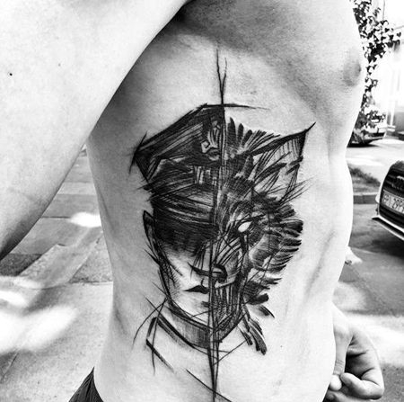 点线侧腰狼人像纹身图案