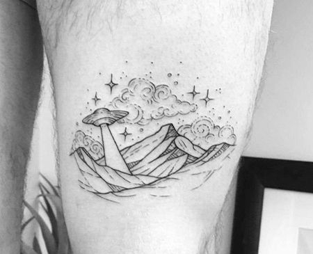 线条大腿山飞碟纹身图案