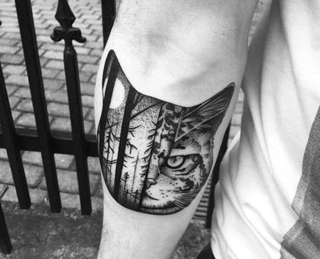 点线小臂猫树纹身图案