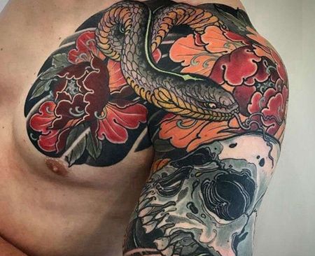 新传统大臂蛇骷髅牡丹纹身图案