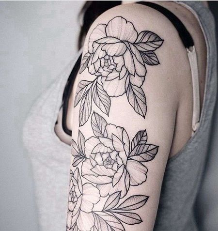 大臂点线花卉纹身图案