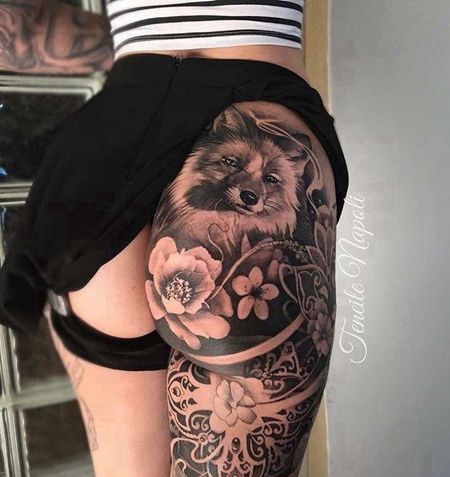 写实大腿浣熊纹身图案