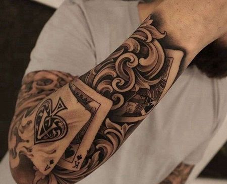 写实小臂扑克纹身图案