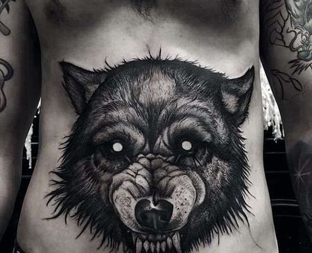 点线腹部狼纹身图案