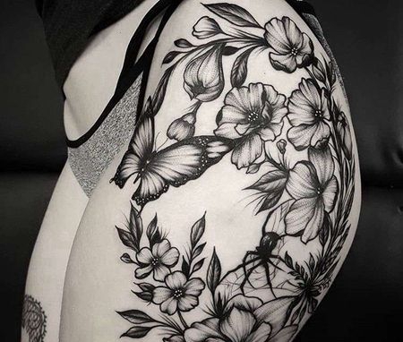 点线大臂花卉蝴蝶纹身图案