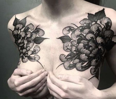 点线锁骨菊花纹身图案