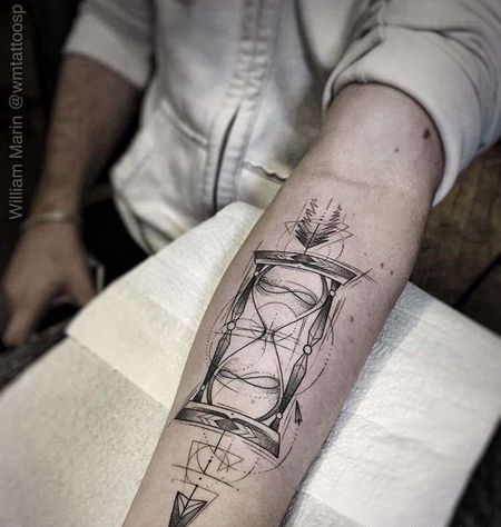 点线小臂沙漏纹身图案