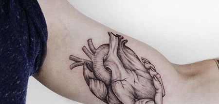 点线大臂心脏手纹身图案